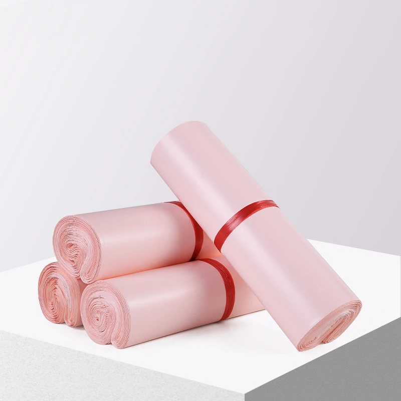 50 stücke rosa Umschlag Kurier beutel Produkt verpackungs beutel wasserdichte selbst klebende Siegel beutel Versandt aschen Plastik transport beutel