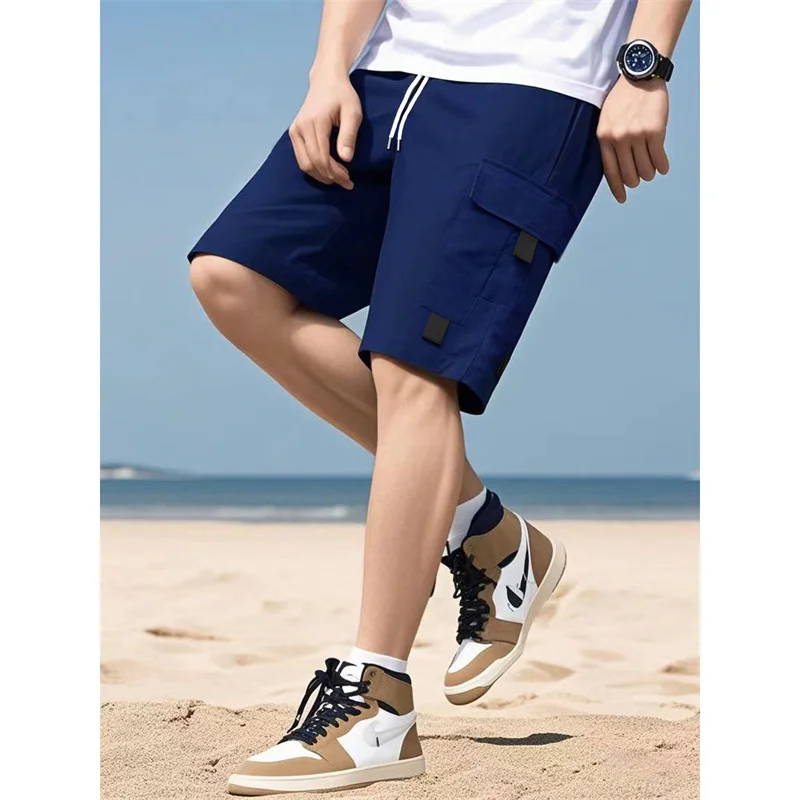 2025 صيف جديد نمط الرجال لون نقي عادية الرياضة الركض البضائع السراويل الرجال فضفاضة مستقيم الساق متعددة جيب خمسة أرباع السراويل ﻿