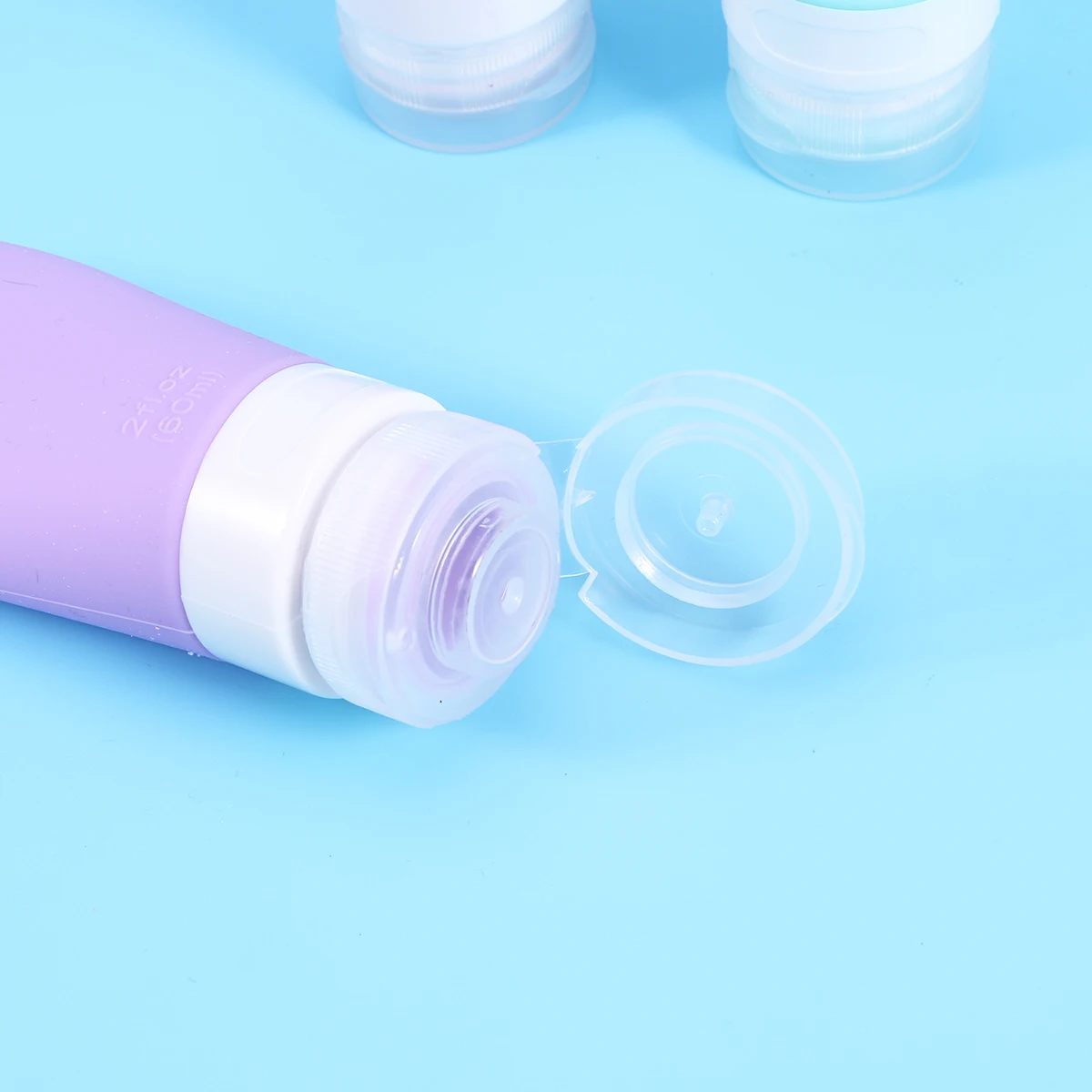 

3pcs 60ML Silicone Dispensing Bottle Sub-bottle Travel Set Portable Bottle (Purple & Pink & Blue)