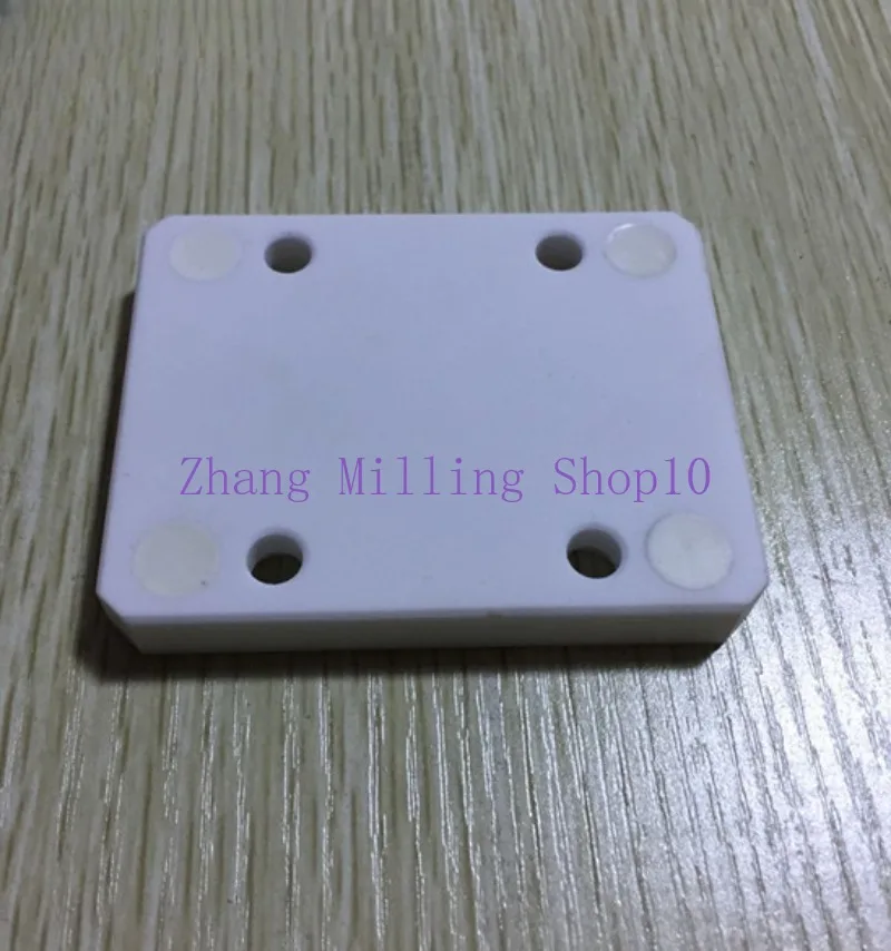 1PC ลวด EDM F302 A290-8021-X709 เซรามิค Isolator แผ่น 75x60x10 มม.สําหรับ Fanuc O,P,Q,R,T,W series ลวดตัด EDM เครื่องบริการ