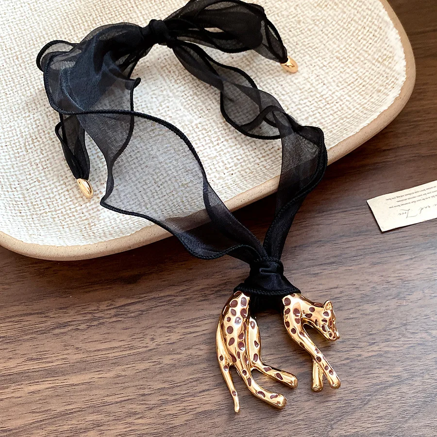 Collares con colgante de leopardo y aceite de goteo europeo y americano para mujer, cadena de clavícula desmontable de malla negra creativa, joyería K1