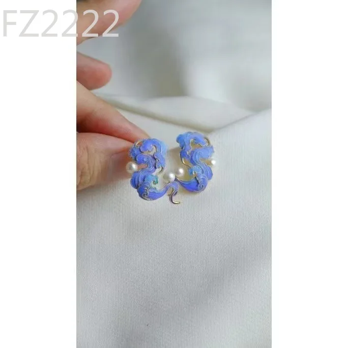 

Guochao versatile fashion enamel design filigree inlay process imitation pearl Xiangyun Guofeng stud earrings wholesale