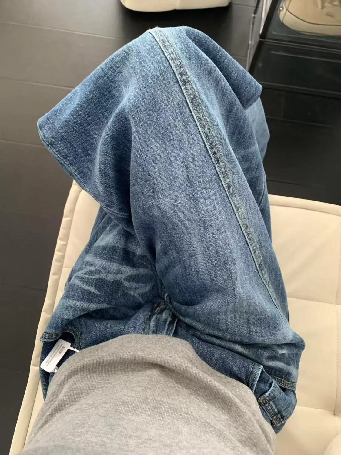 بنطال جينز أنيق على طراز الشارع الأمريكي بحاشية منحنية عتيقة للنساء بتصميم منفعل فضفاض مناسب للتخسيس وواسع الساق بطول الأرض من قماش الدنيم