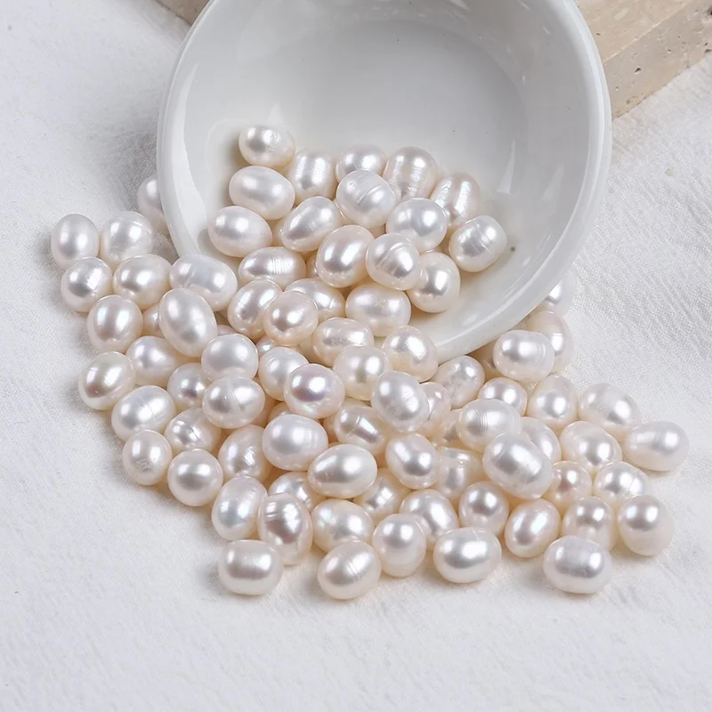 

Wholesale 7.3-8.3mm natural white rice freshwater loose pearls beads for DIY jewelry making