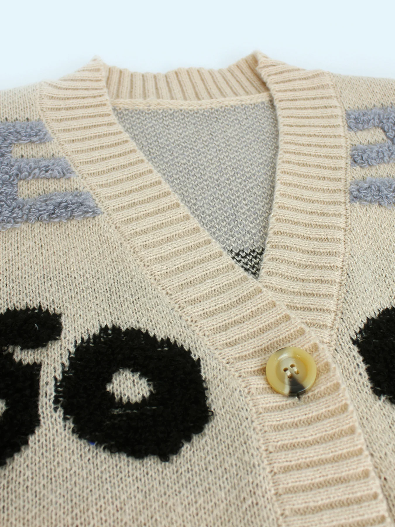 Mid length letter jacquard knitted sweater with cardigan jacket for spring, autumn, and winter