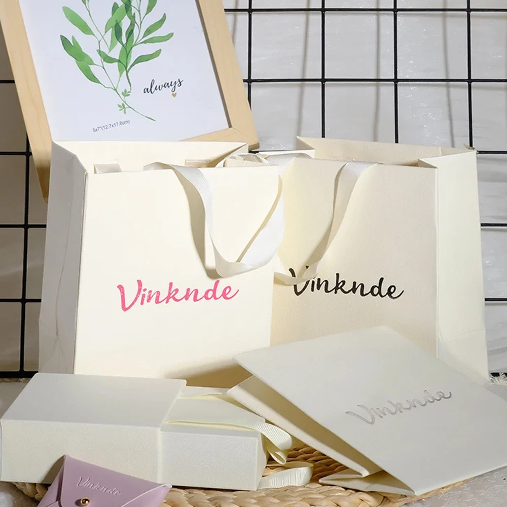

Custom Logo Boutique Paper Bags with Handle for Clothing Cosmetic Jewelry Wedding Gift Tote Pouch - Eco-Friendly Packaging Sack