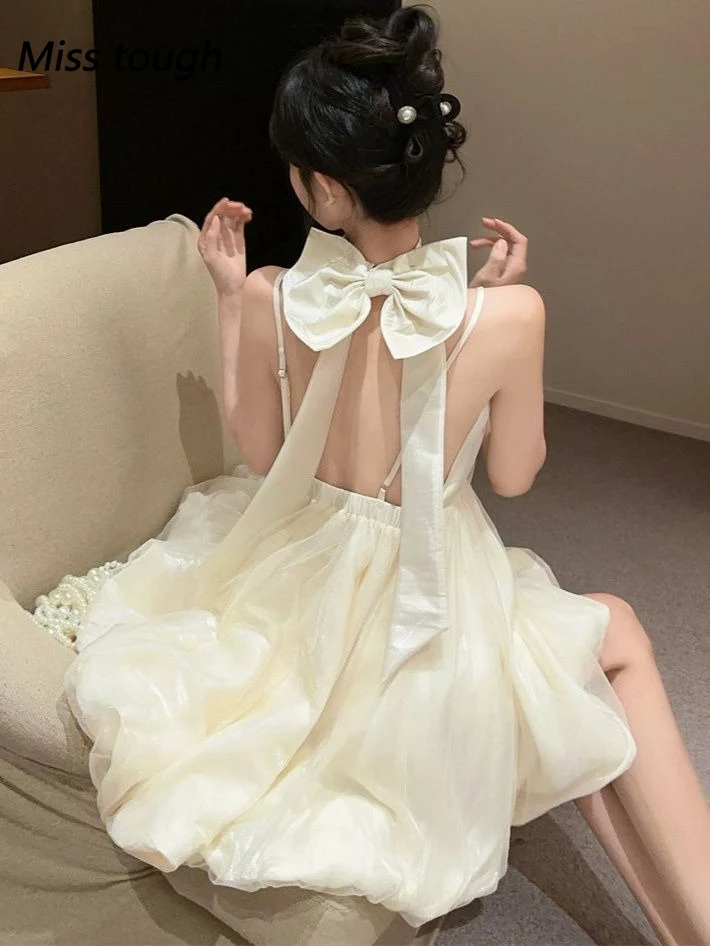 Backless Bowknot 퍼프 드레스 여성 민소매 우아한 공주 스타일 요정 Tulle 미니 드레스 여름 세련된 흰색 패션 의상 새로운
