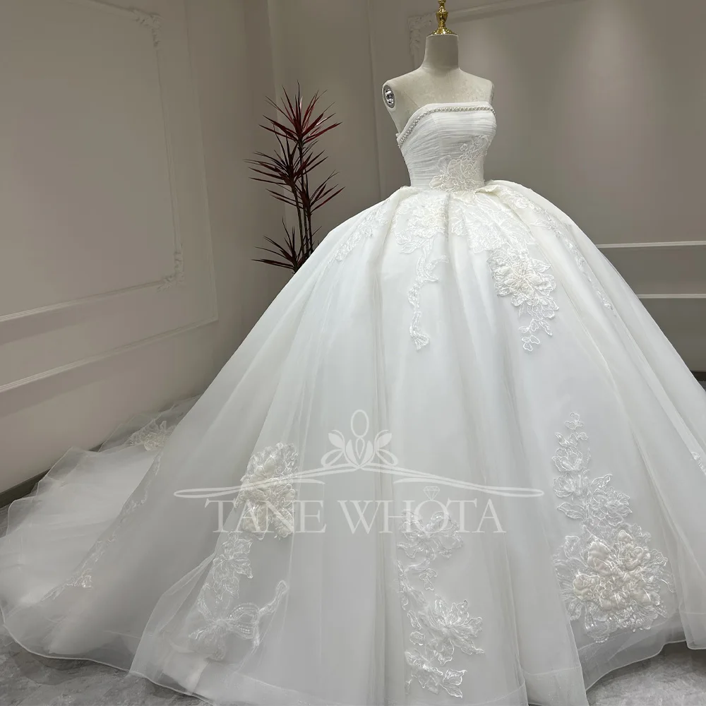 Suknia ślubna 2025 без бретелек без рукавов на шнуровке сзади бальное платье с вышивкой бисером свадебное платье по индивидуальному заказу роскошное