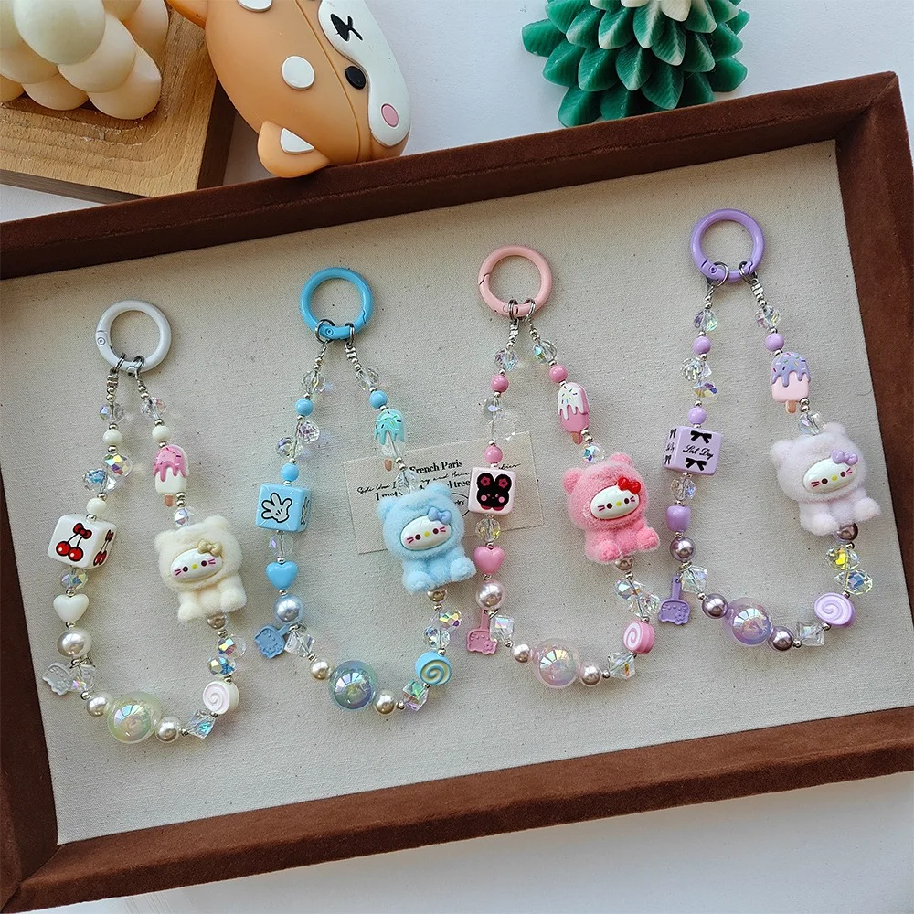 Funda de teléfono Sanrio Hello Kitty INS Kawaii, cordón decorativo para niña y mujer, correa de muñeca antipérdida, colgante, accesorios para funda de llavero