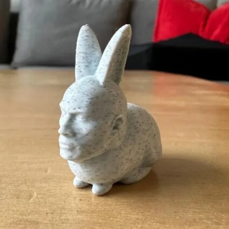 A rabbit statue with a human face, suitable for home decoration