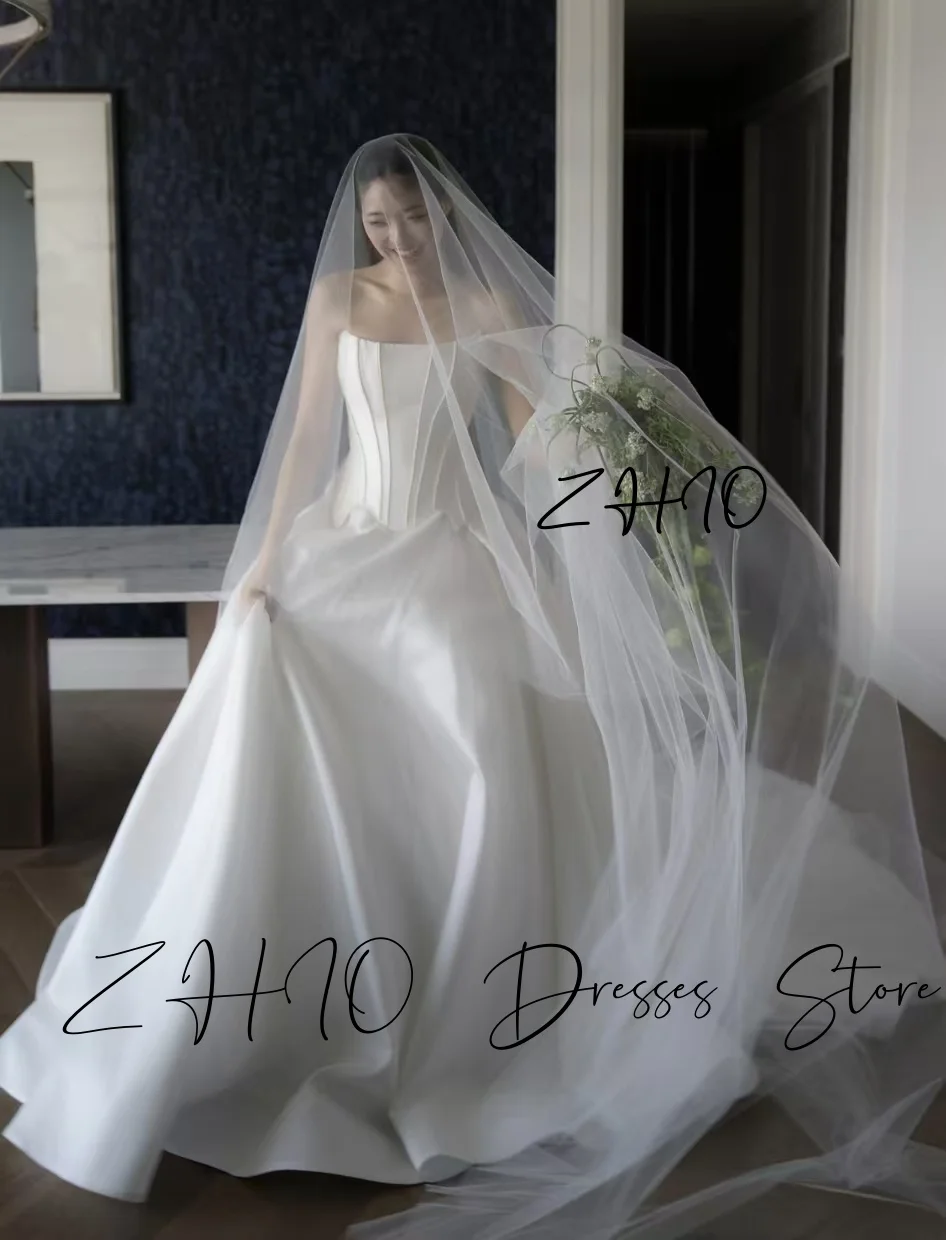 ZHIO فستان حفلات الزفاف الأبيض الأنيق بدون حمالات مشد على شكل حرف a طول الأرض من التفتا كوريا لالتقاط الصور فستان زفاف مخصص