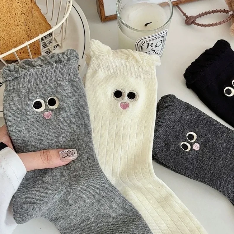 4 أزواج الخريف الشتاء المرأة Coquette الجوارب لطيف الكرتون عيون منتصف أنبوب قبضة الجوارب مجموعة الجوارب المدرسية البيضاء للفتيات بالجملة