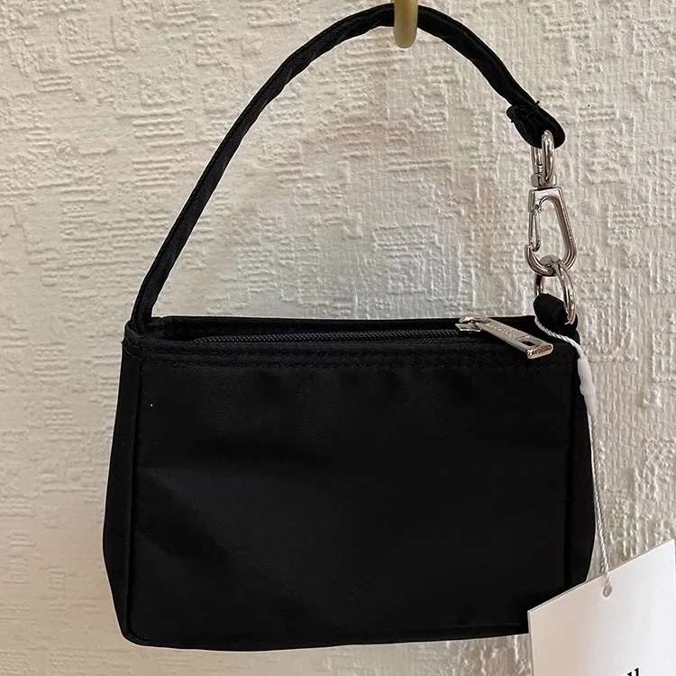 

Mucu And Ebony Canvas Coin Purse Handbag Underarm Bag Trendy Women's Bag Double Strap Cotton Material Spring 2023 Collection