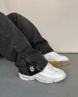 2025 Hip-hop pantalones vaqueros con monedas doradas Y2K retro cintura baja pantalones con cremallera de pierna ancha y2k ropa de moda para hombres pantalones vaqueros sueltos bordados