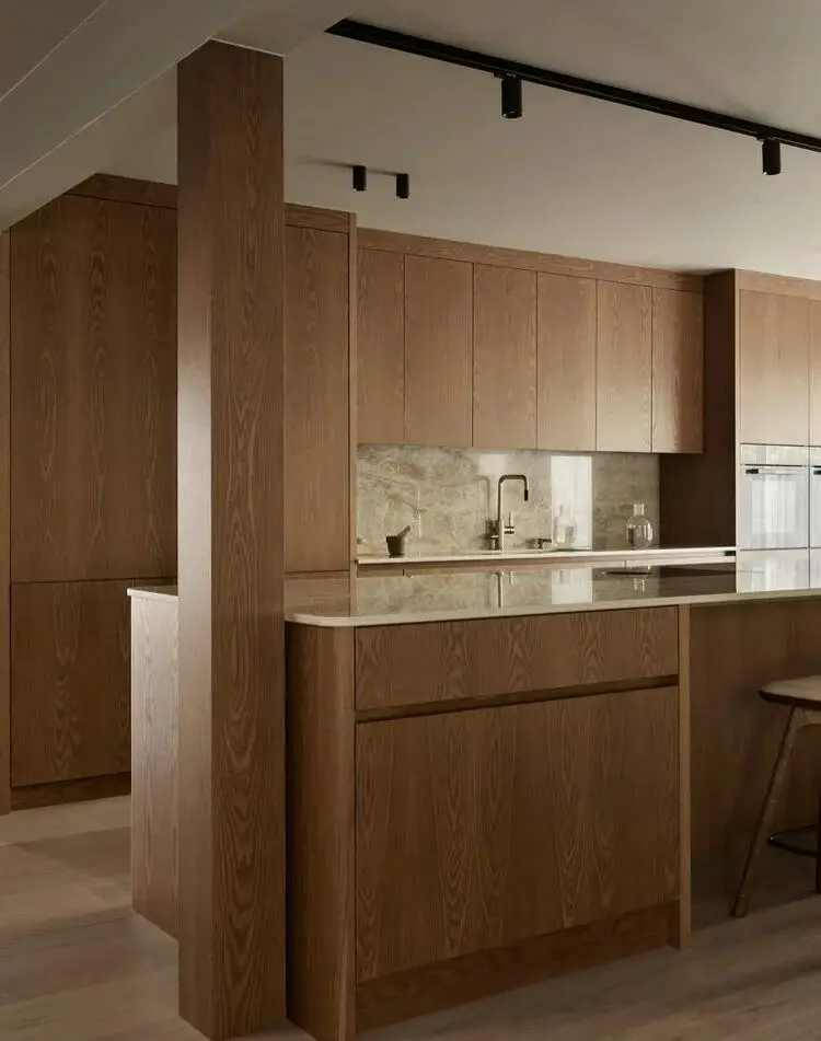 Light brown oak meets matte textured modern kitchen cabinet