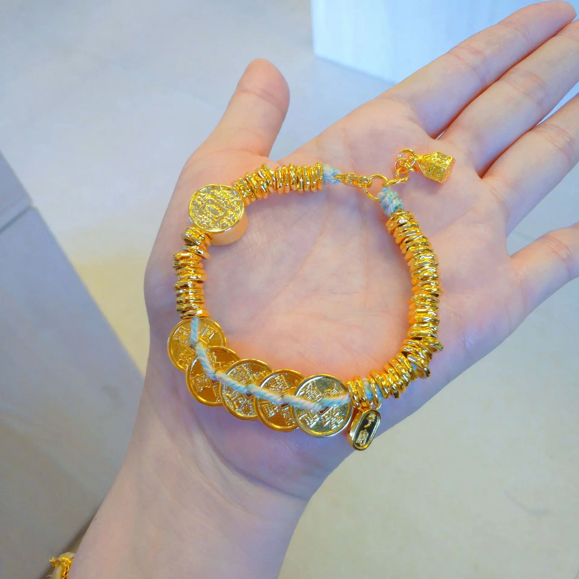 

Women's 24K Gold AU999 Coiled Blessing Ethnic Bracelet | Titanium-edged with glow-in-the-dark rope, vibrant for festivals