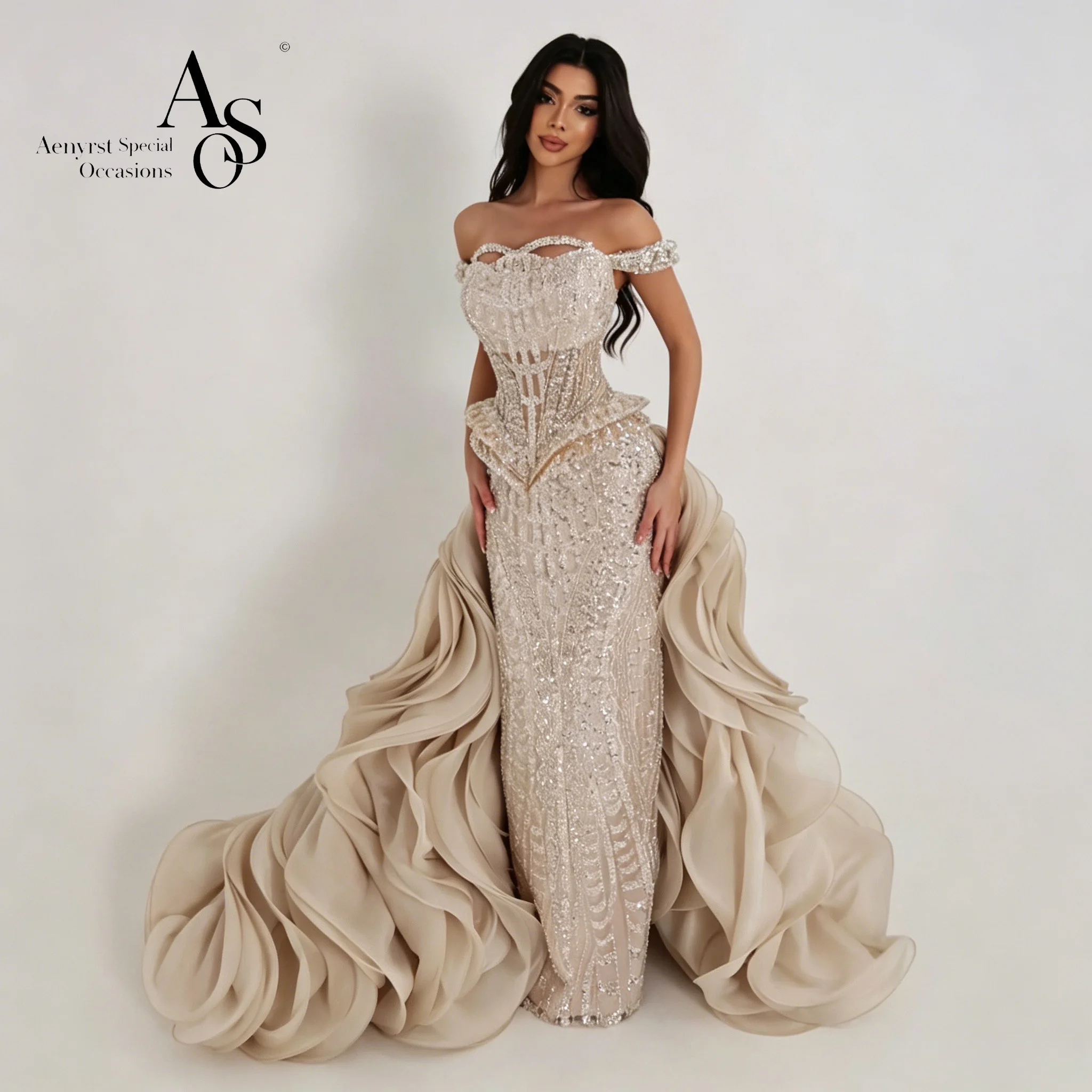 

An elegant, light ivory one-shoulder off-shoulder sweetheart dress for women, featuring beaded lace details and a fluffy large s