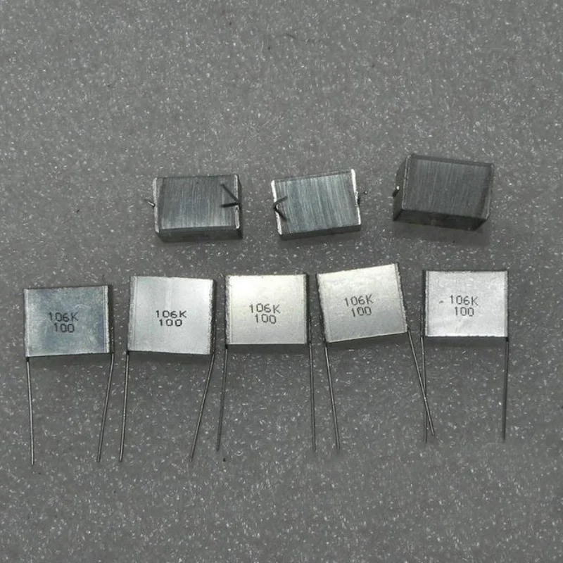 

Совершенно новый оригинальный многослойный неиндуктивный конденсатор 100v10UF (106k) с разделением частоты торта, сложенный неодуктивный конденсатор 15*10*13 мм P15MM