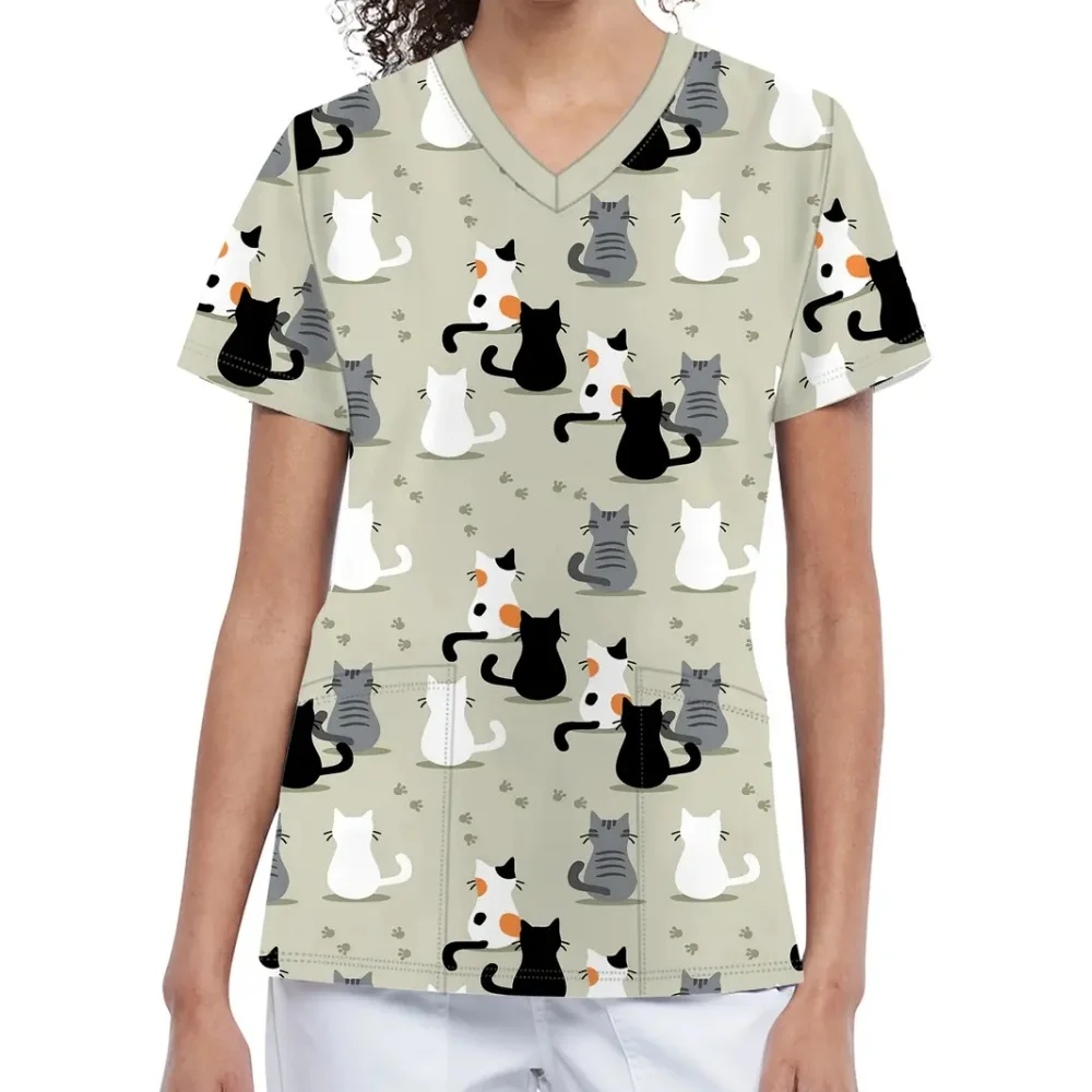 手術服女性かわいい漫画プリント獣医看護師夏のファッション V ネック半袖ポケット付きスクラブ女性トップス