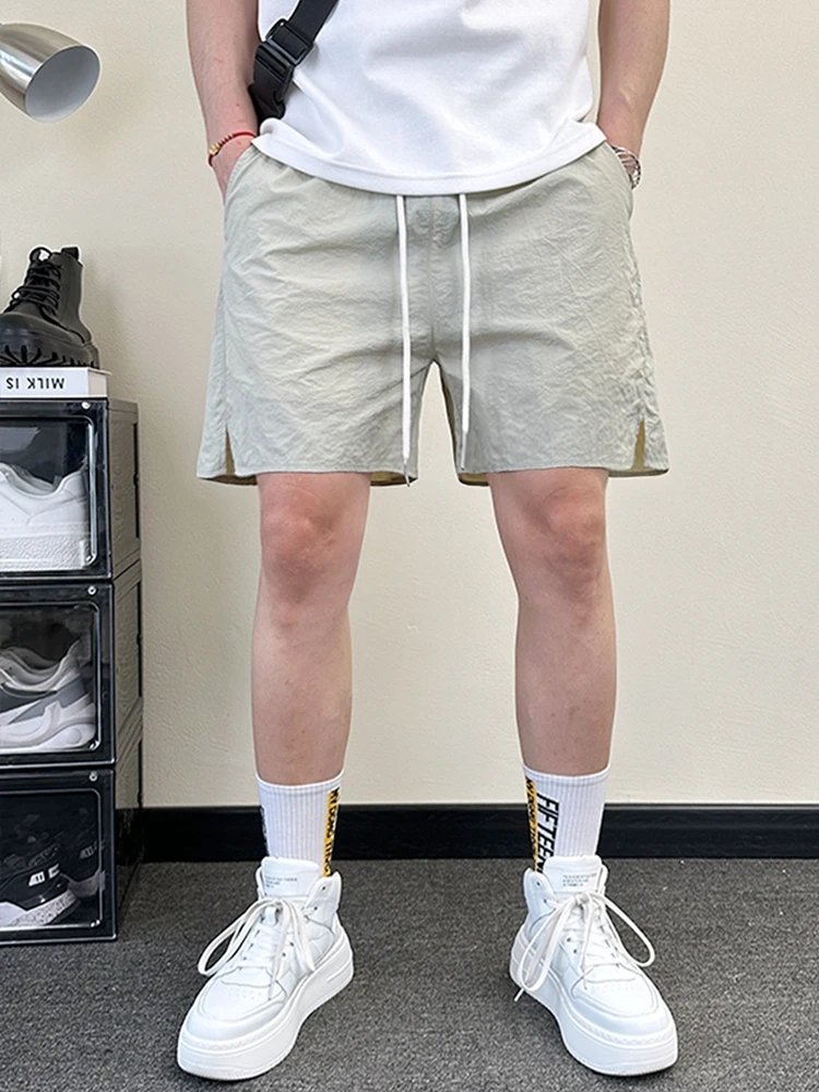 

Мужские модные повседневные спортивные шорты для дома и улицы, пляжные брюки длиной четыре пятых, быстросохнущие, дышащие, новинка лета 2024