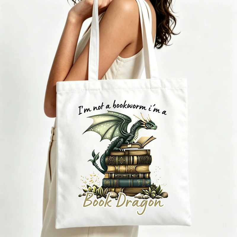 fantasy dragon and book stack graphic canvas tote bag, casual style for daily reading and bookstore outings