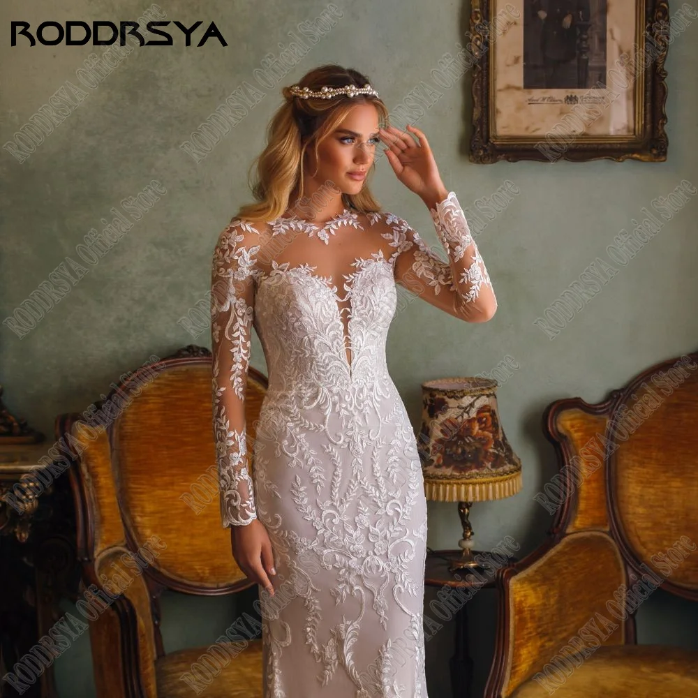 RODDRSYA Exquisite Zeemeermin Bruidsjurk Lange Mouwen O-hals Kant Applique BruidsjurRODDRSYA voortreffelijke zeemeermin trouwjurk lange mouwen met O-hals kant applique bruidsjurken illusie terug Tulle Vestidos De Novia