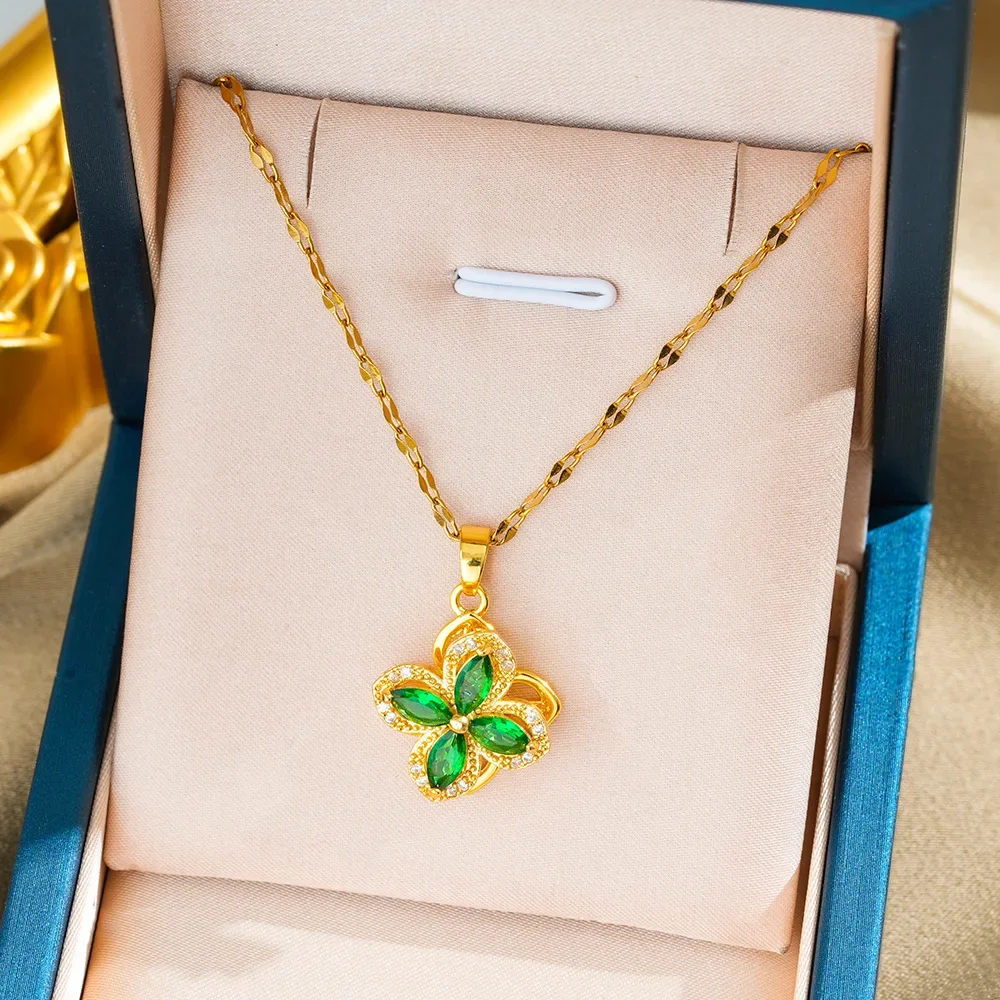 2025 new A set of women's necklace rings featuring a rotating four-leaf flower set with zircon titanium steel