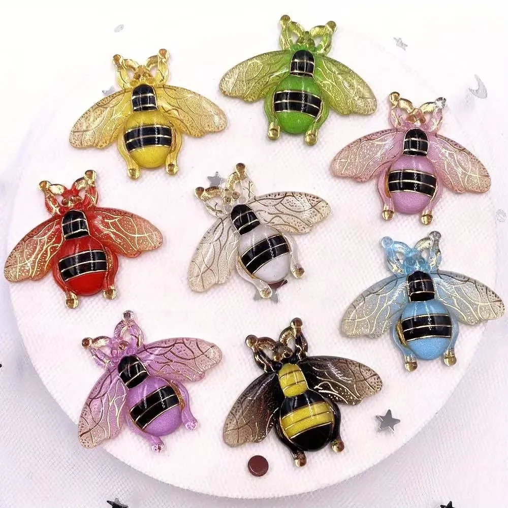 8 brightly colored, glossy, bee-shaped flat-back half-beads, suitable for DIY jewelry making.