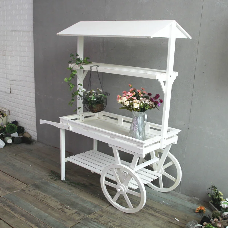 Beautiful white wooden wood cart wheels for party white cart events rent birthday wedding kids candy flower white wooden cart