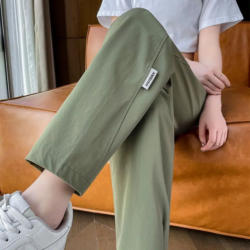 

Korean Commuter 2024 Summer New Women's Thin High Waist Pockets Solid Color Loose Straight Casual Sports Quick Dry Harlan Pants