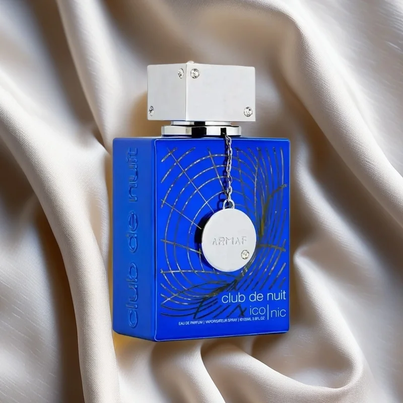 

Armaf Club de Nuit Iconic Unisex Eau de Parfum, 105 мл - Потрясающая синяя бутылка с серебряными акцентами, Exudes a Captivating and Timel