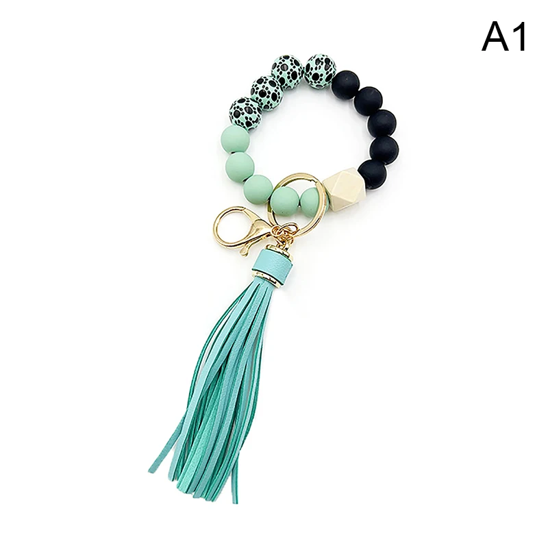 Creative Silicone Tassel Wood Bead Wrist Keychain Bag Pendant Wristlet Keychain Bracelet With Leather Tassel Car Keychain