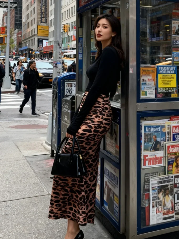 Gonna lunga stampata leopardata retrò moda donna gonne a coda di pesce sottili pieghettate a vita alta 2026 Lady Holiday Street Chic Wear Nuovo