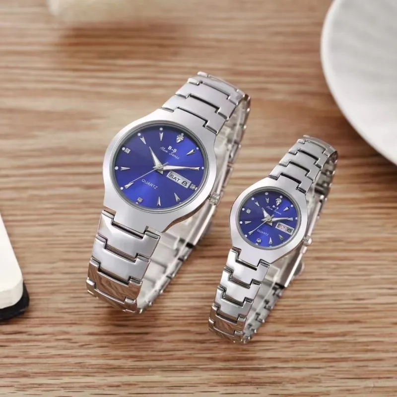 Cross border foreign trade new fashionable alloy steel strip dual calendar diamond inlaid men's and women's couple quartz decora