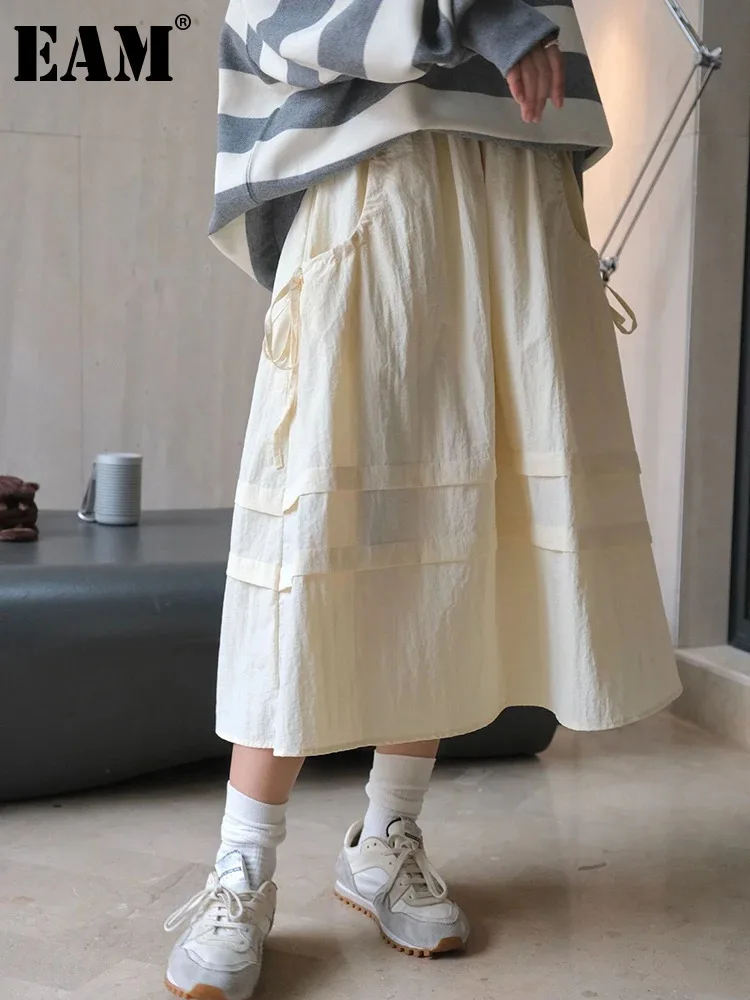 

[EAM] High Elastic Waist Beige Pocket Casual Midi A-line Half-body Skirt Women Fashion Tide New Spring Autumn 2024 1DH6408