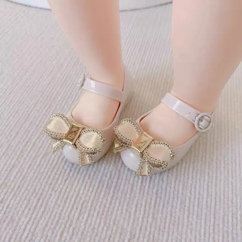 Mini Melissa sandali estivi per ragazze fiocco antiscivolo suola morbida Versatile solido coreano bambini dolci scarpe da principessa sandali da