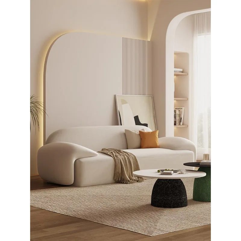 

Designer cream fabric sofa Internet celebrity creative straight row small apartment living room light luxury beauty salon rest a