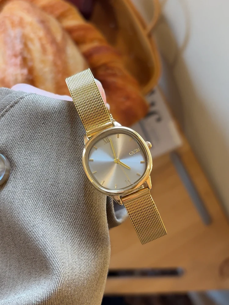 

Women's watch, sophisticated gray color, minimalist round dial, suitable for students, a light luxury gift for women.