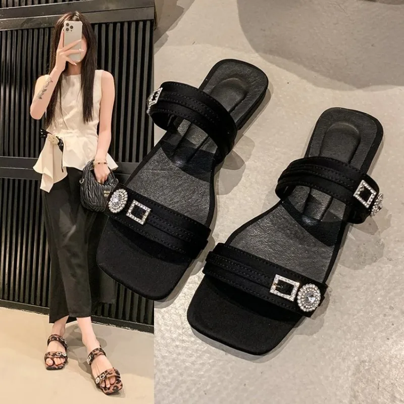 

2025 Summer Woman Flat Slippers Woman Metal Buckle Flat Sandals Women Sexy Black Sandals Round Toe Slingback Shoes Plus Size 43