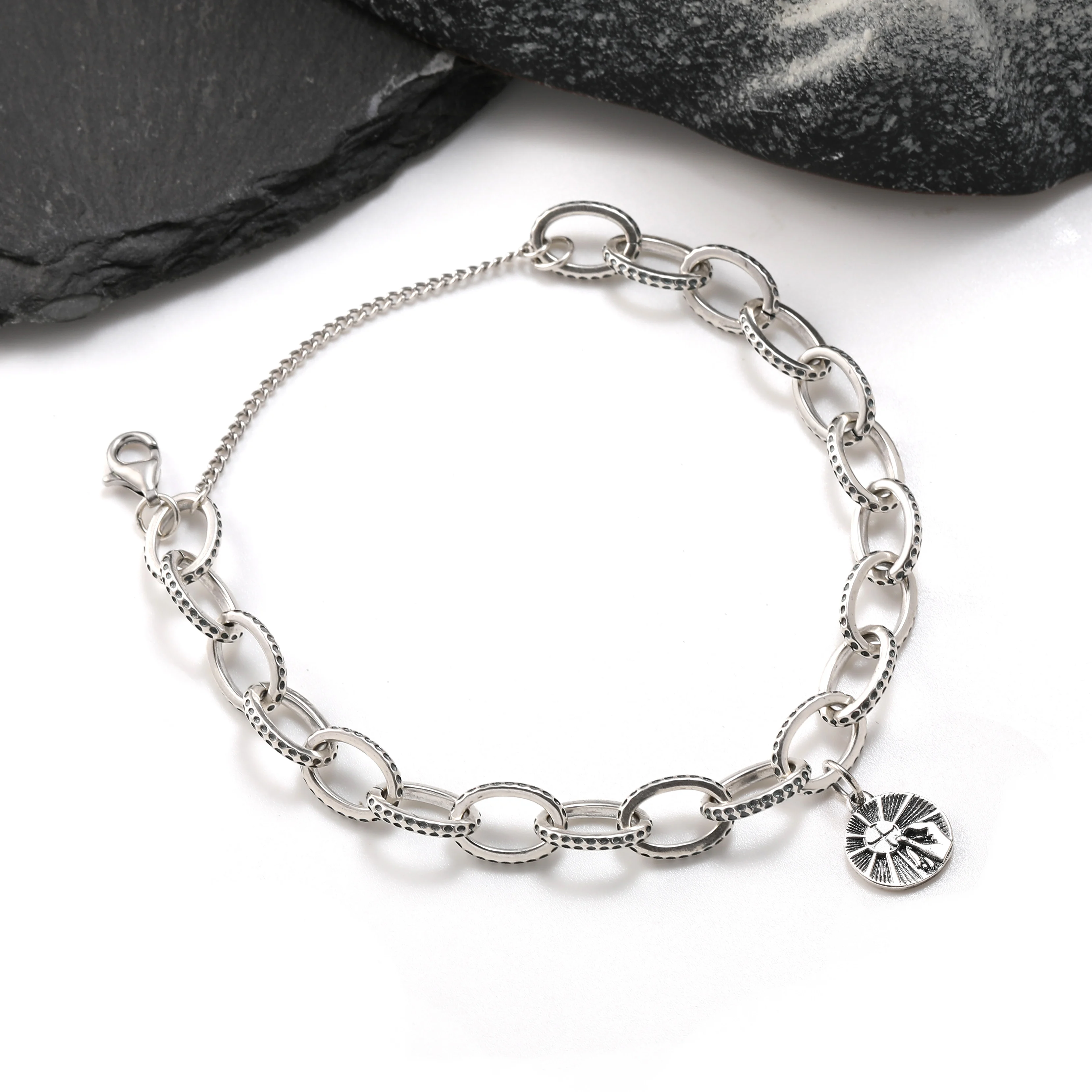

Genuine 925 sterling silver exquisite Textured Oval Charm Bracelet paired with The first Eucharistic Medal pendant