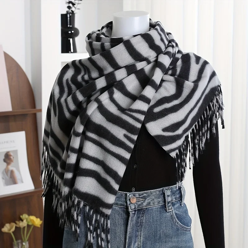 A fashionable, thick, zebra-patterned scarf for autumn and winter, offering both decoration and warmth, available in a variety o