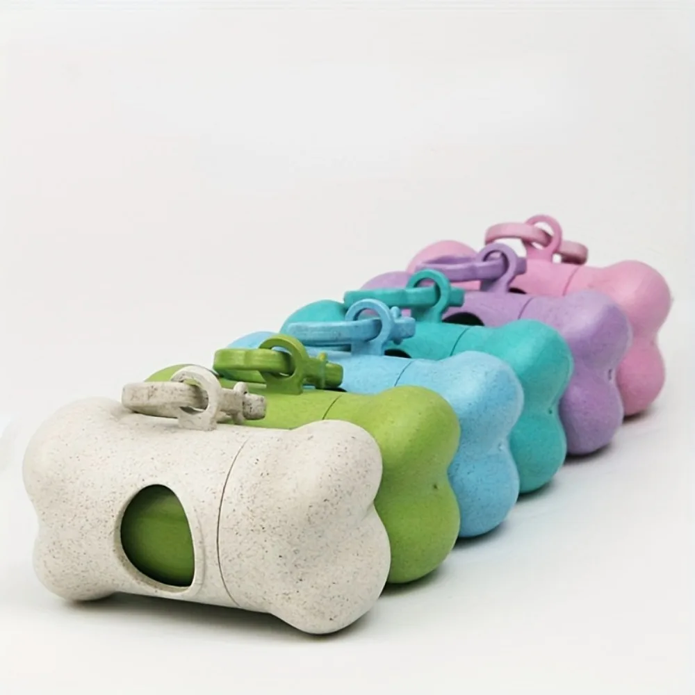 Dispensador portátil de bolsas de basura para mascotas en forma de hueso con clip de remolque, esencial para mascotas al aire libre, accesorios para mascotas para tomar una paseo