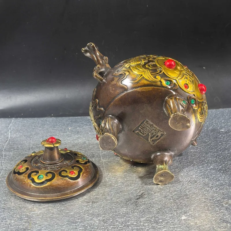 Gilt copper three-legged incense burner with the character 