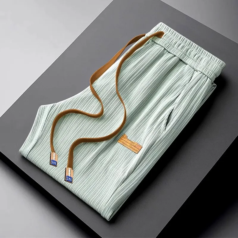Nuovo 2025 da uomo in seta di ghiaccio sensazione di freschezza vestibilità ampia pantaloni a gamba dritta sottile Qui Dry sport estivo americano casual di grandi dimensioni