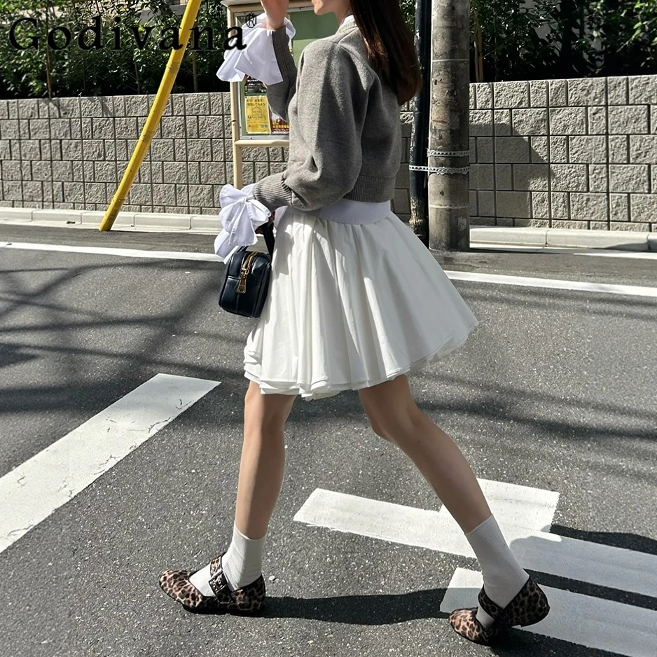 النمط الياباني الحلو الأبيض تنورة قصيرة ربيع الخريف 2025 المرأة مرونة الخصر غير النظامية منتفخ تنورة الفتيات اليومية تنورة غير رسمية #1