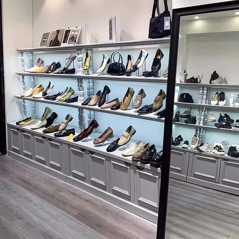 custom.High Quality Modern Elegant Shoe Cabinet Display Shoe Store Display Racks Shoes Showroom Design