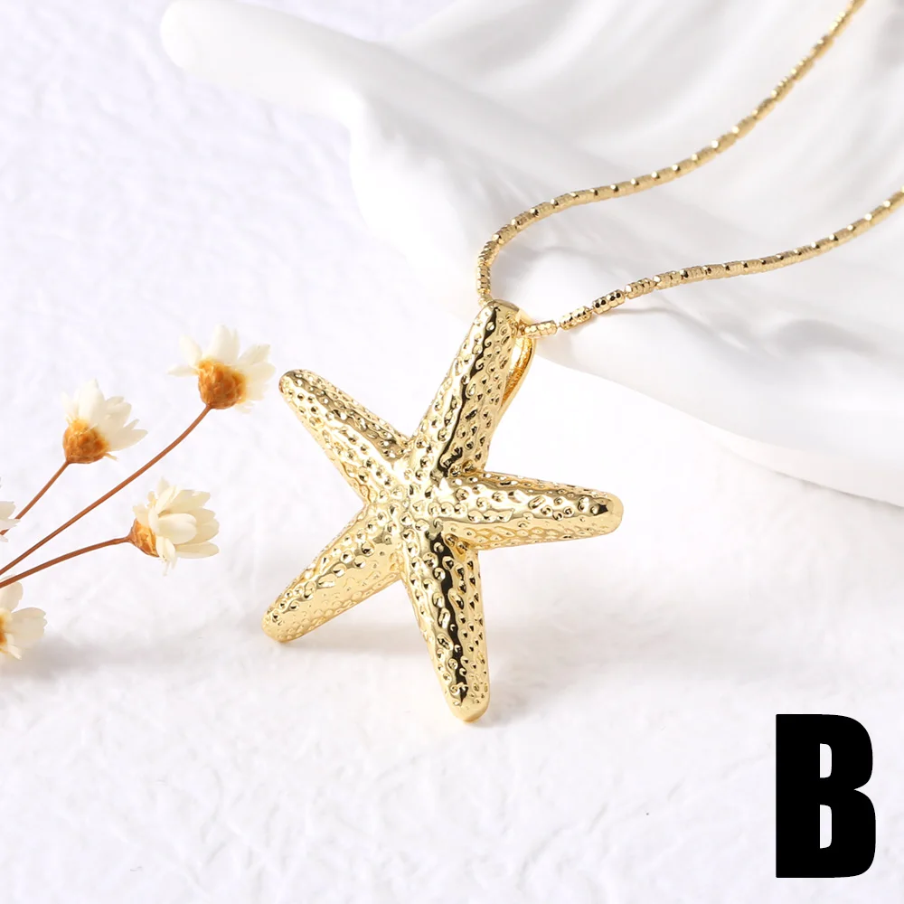 FLOLA Simple Gold Plated Starfish Conch Necklaces for Women White Pearl Flower Necklaces Beach Jewelry Gifts nkeb593