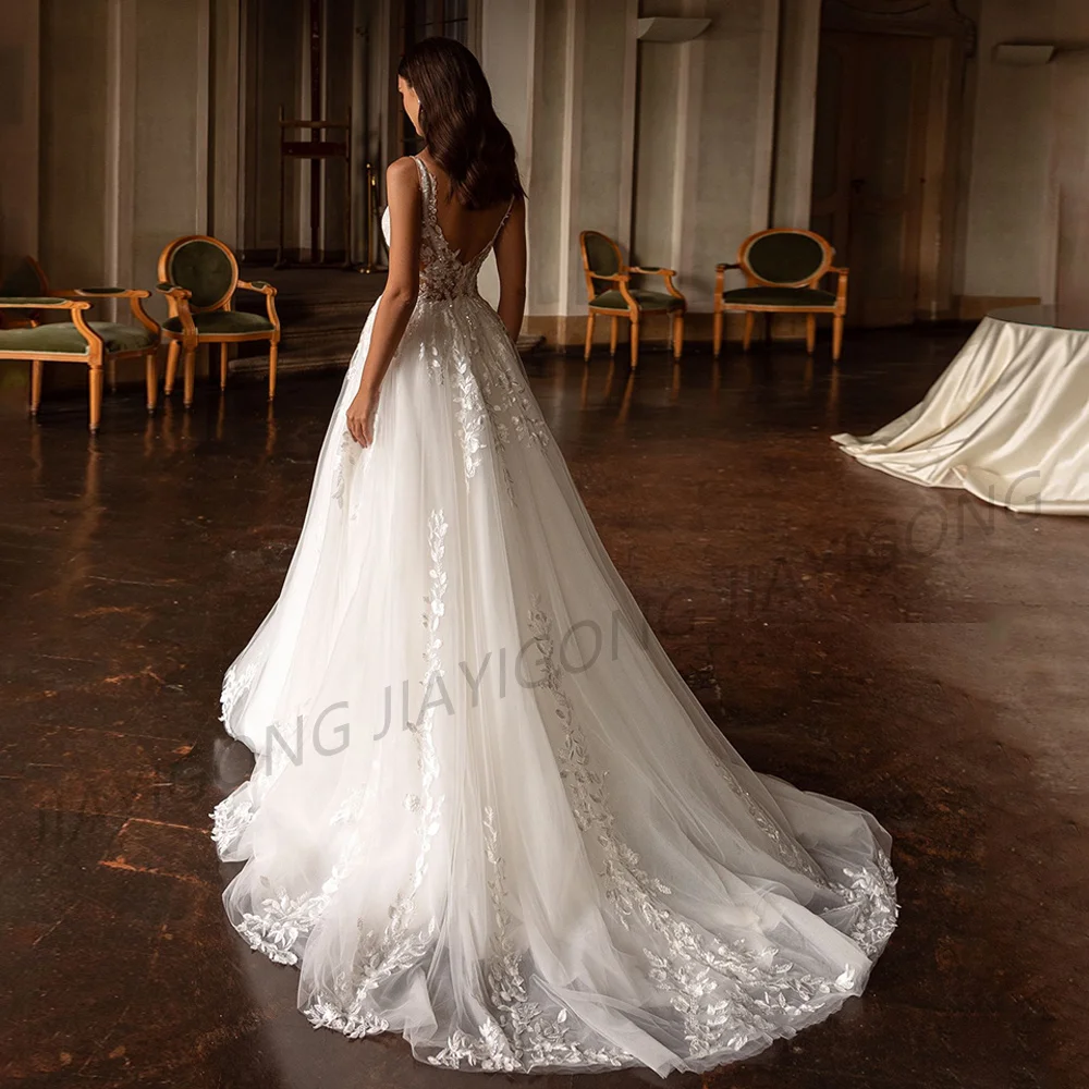 Sexy Wedding Dress Sleeveless Deep V Neck Sequined Applique Backless A Line Soft Tulle Vestidos De Novia Bride Bridal Gown