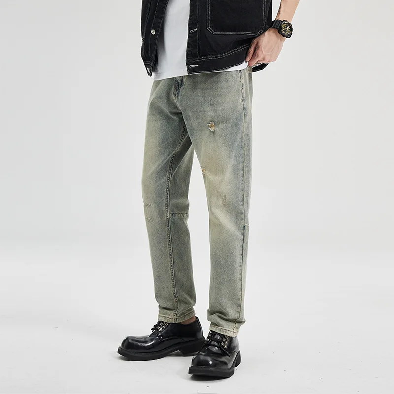 アメリカンウォッシュ加工のヴィンテージ風メンズジーンズ、フィット感があり、ややテーパード、ストレッチ入り
