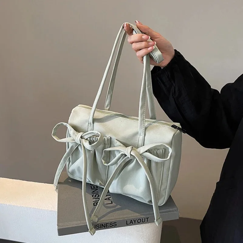 

2025Fashionable and Sweet Design Tote Bag Folded Large Capacity Commuter Women's Handbag New Korean Bow Nylon Shoulder Bag